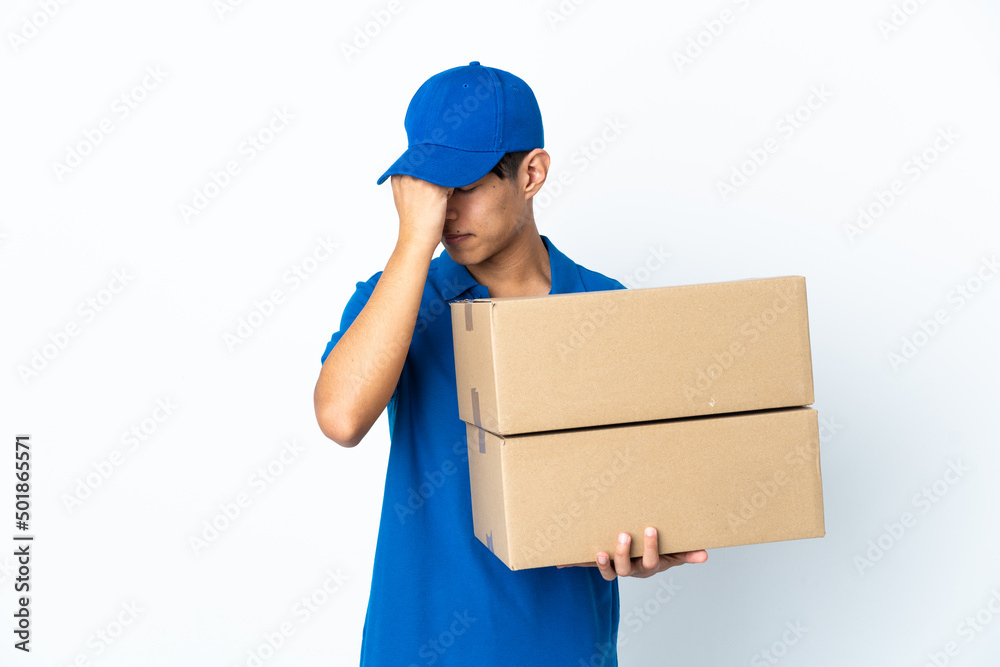 Delivery Chinese man isolated on white background with headache