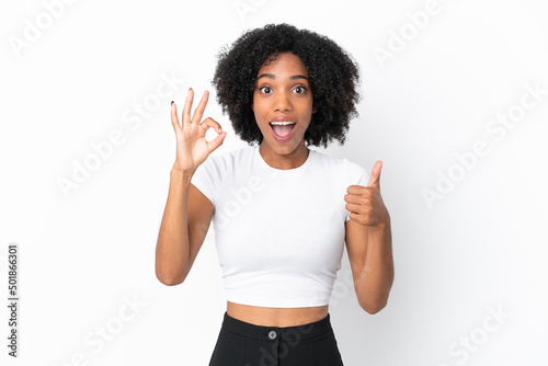 Young African American woman isolated on white background showing ok sign and thumb up gesture