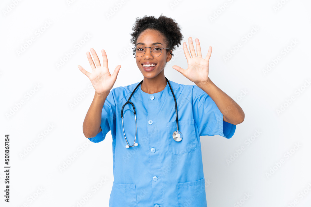 Young surgeon African American doctor woman isolated on white background counting ten with fingers Young surgeon African American doctor woman isolated on white background counting ten with fingers