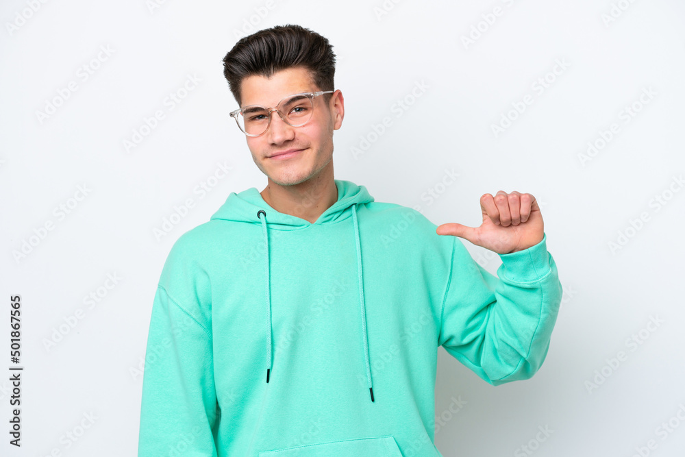 Young handsome caucasian man isolated on white bakcground proud and self-satisfied Young handsome caucasian man isolated on white bakcground proud and self-satisfied