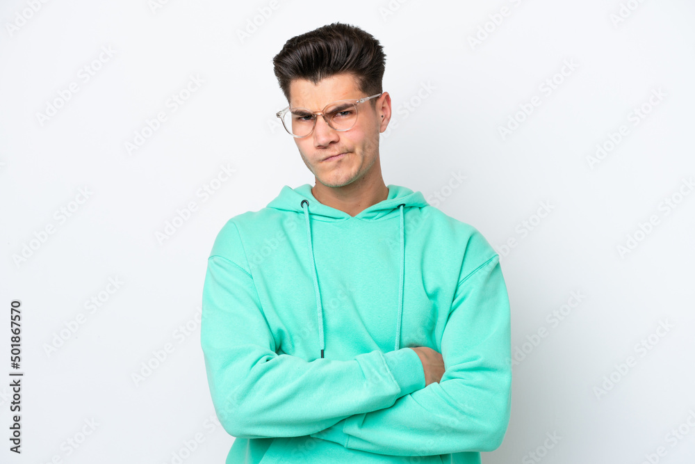 Young handsome caucasian man isolated on white bakcground with unhappy expression Young handsome caucasian man isolated on white bakcground with unhappy expression