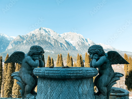 Statue of angels at mountain