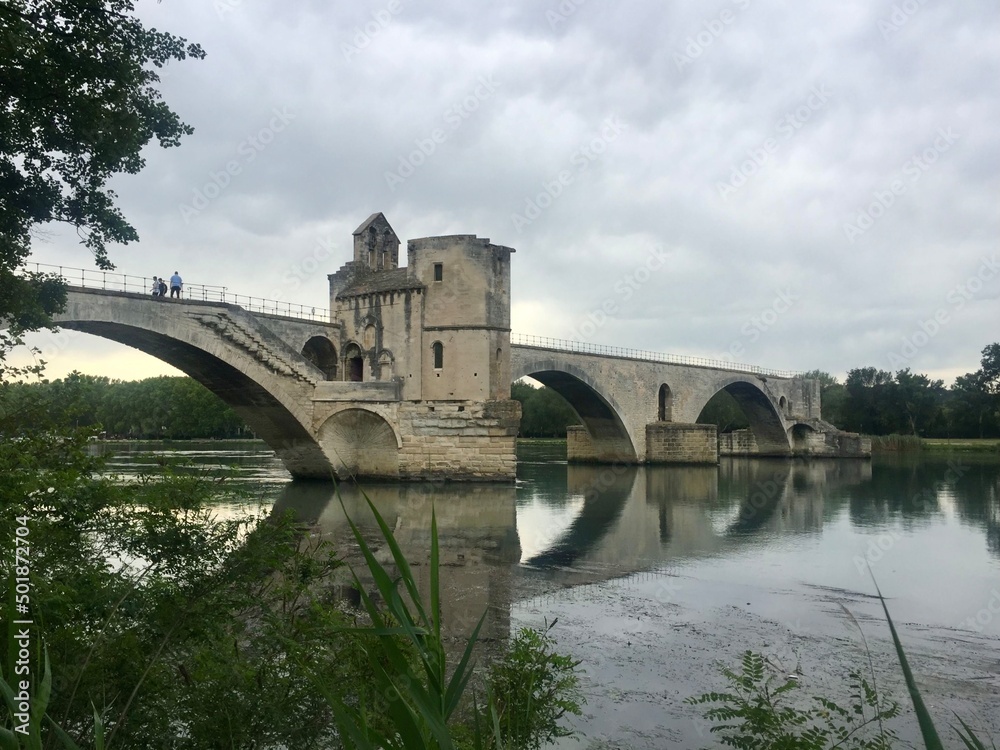 Pont d'Avignon bridge over Rhone in Avignon,Provence. View of Pont d’Avignon (famous medieval bridge) from Boulevard de la Ligne. Historic remains of 12th century bridge over Rhone river in Provence Pont d'Avignon bridge over Rhone in Avignon,Provence. View of Pont d’Avignon (famous medieval bridge) from Boulevard de la Ligne. Historic remains of 12th century bridge over Rhone river in Provence