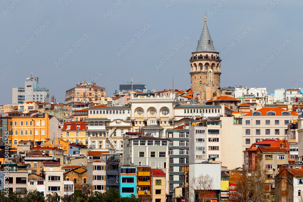 Fototapeta premium galata tower rising from the buildings