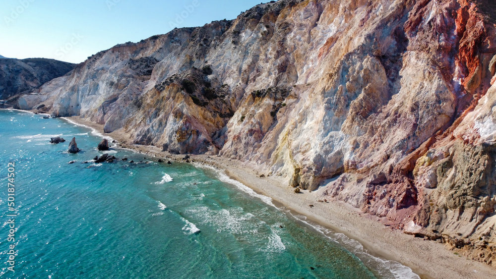 aerial view of fyriplaka beach with spectacular rock formations and colored cliffs - Milos island, Greece