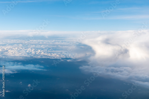 White cumulus clouds on clear blue sky background closeup, overcast skies backdrop, fluffy cloud texture, beautiful sunny cloudscape heaven, ozone layer illustration, scenic cloudy weather, copy space