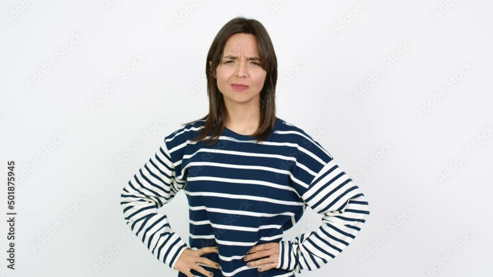 Young brunette woman looking far away with hand to look something over isolated background Young brunette woman looking far away with hand to look something over isolated background