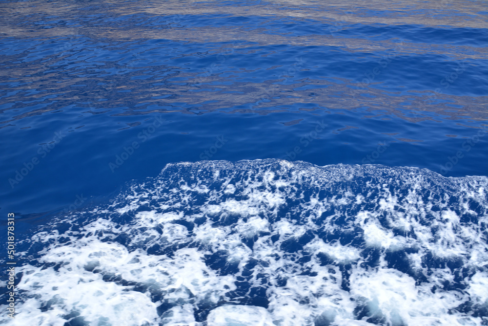 Fototapeta premium blue water of mediterranean sea with sea foam