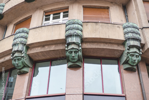 Photography head scultpture on building on Vaclaske Namesti street, Prague, Czech Republik