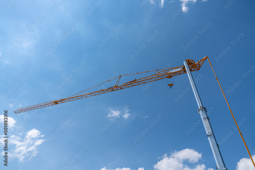 Remotely controlled unmanned construction crane