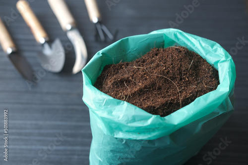  coco peat and gardening tools a table with copy space 