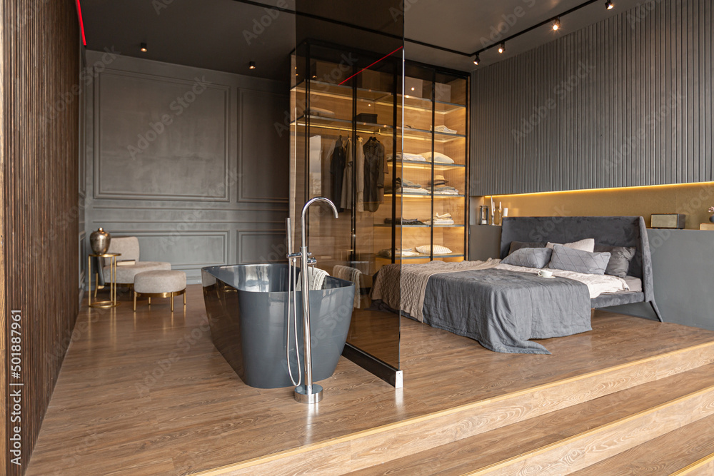 outstanding bath and bedroom of a chic modern design of a dark ...
