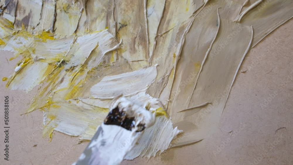 Closeup of a painting with spatula, oil paint and putty, creative artistic approaches Closeup of a painting with spatula, oil paint and putty, creative artistic approaches