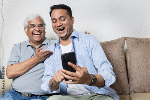 Father son and grandson Having fun together at home, candid moments