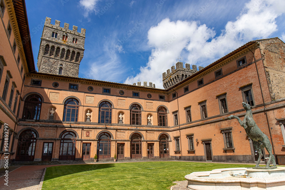 Fototapeta premium Torre Alfina, a beautiful Italian village in the province of Viterbo, near Acquapendente. Historic castle of Torre Alfina near the Sasseto wood.