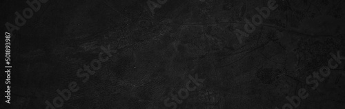 Panoramic Scary dark walls, slightly light black concrete cement texture for background