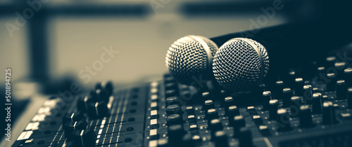 Close-up microphone and sound mixer in studio for sound record control system and audio equipment and music instrument photo