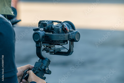 Fotografia Gimbal stabilizer with mirrorless digital camera anti shake for video production