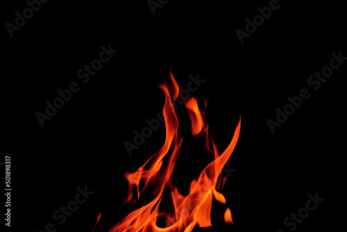 Close up burning flames on black background for graphic design or wallpaper © Nattawut