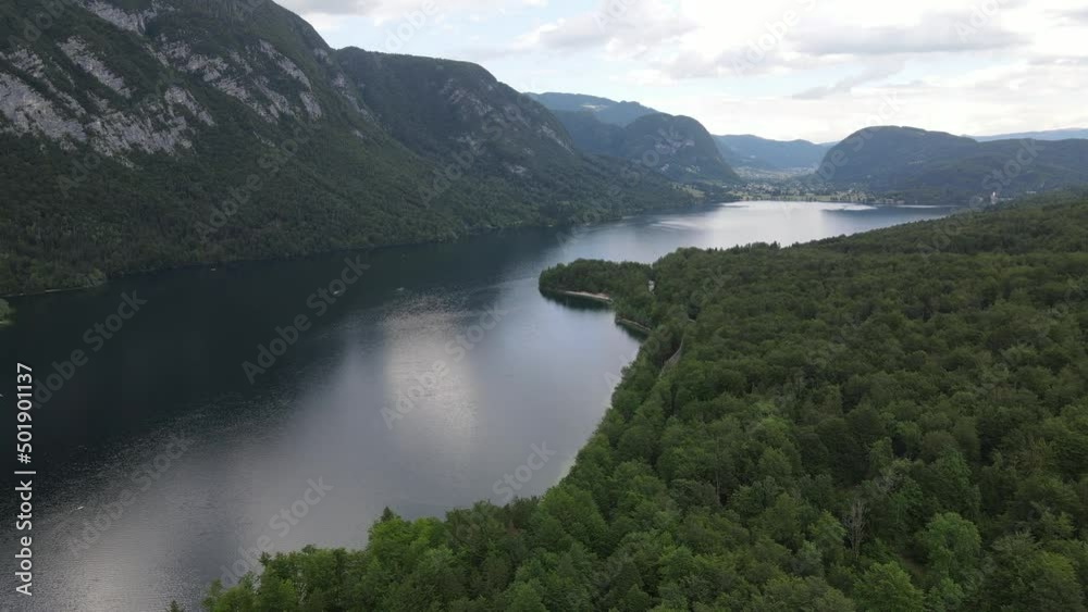 Aerial drone shot of Bohinj lake in Slovenia. Europe summer nature. Lake between mountains. Aerial drone shot of Bohinj lake in Slovenia. Europe summer nature. Lake between mountains.