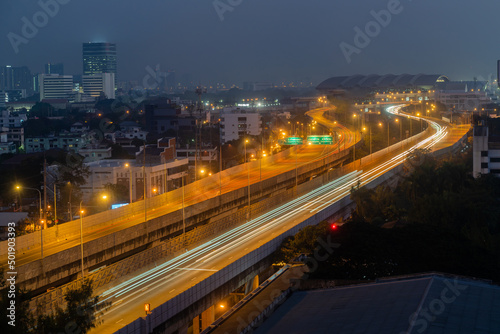 Bangkok with light paths on Sathorn Road in the heart of Bangkok's central business district. Bangkok at sunset