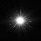 Shining silver star isolated on black background. The star burst with brilliance. Glow effect.