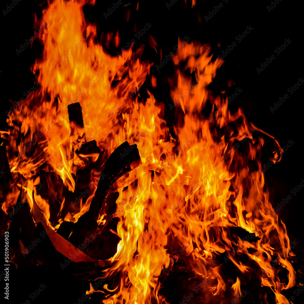 Fire flames on black background, Blaze fire flame texture background, Beautifully, the fire is burning, Fire flames with wood and cow dung bonfire Fire flames on black background, Blaze fire flame texture background, Beautifully, the fire is burning, Fire flames with wood and cow dung bonfire