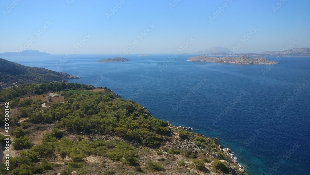 Ruine wall with overlook on blue sea with blue sky Ruine wall with overlook on blue sea with blue sky