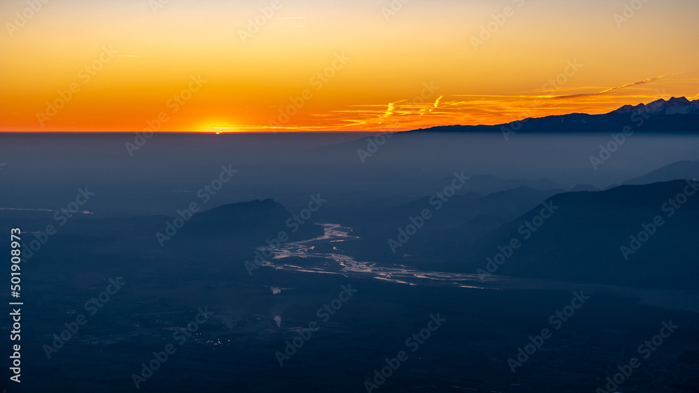 Winter sunset from an alpine peak of Friuli-Venezia Giulia