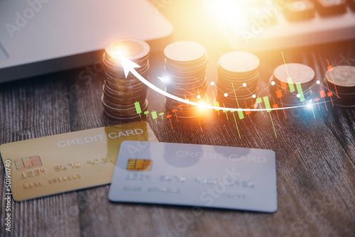 Εκτύπωση καμβά Credit bank card, money and coins on the home wood table, with selective focus,