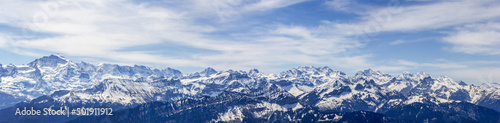 Panorama of Alps mountain peaks Eiger, Moench and Jungfrau in the bernese alps viewed from Niederhorn mountain, Switzerland © Yü Lan