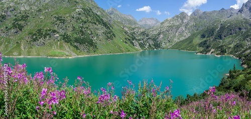 Landscape of the Lake Barbellino an alpine artificial lake. Turquoise water. Italian Alps. Italy. Orobie. Summer time. Relaxing contest photo