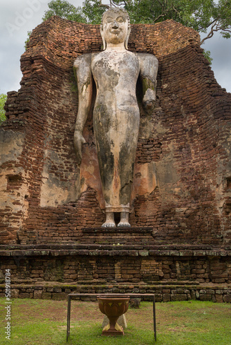 Standing Buddha at Wat Phra Si Iriyabot, Kamphaeng Phet, Thailand photo