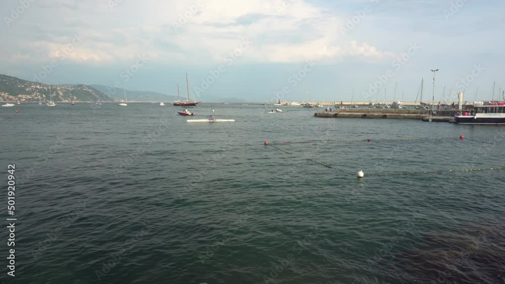 RAPALLO, LIGURIA, ITALY - AUGUST 22, 2018: Ultra-wide view from Rapallo waterfront on Ligurian Sea, Italy. 4K RAPALLO, LIGURIA, ITALY - AUGUST 22, 2018: Ultra-wide view from Rapallo waterfront on Ligurian Sea, Italy. 4K
