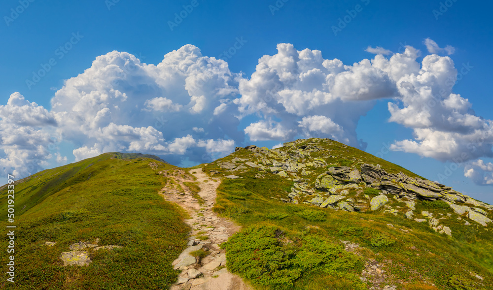 green mougreen mountain ridge with huge stones under cloudy skyntain ridge with huge stones under cloudy sky green mougreen mountain ridge with huge stones under cloudy skyntain ridge with huge stones under cloudy sky