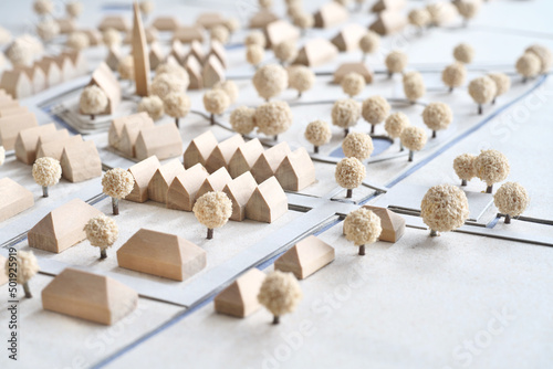 Architectural Model, miniature construction of a village out of houses in different shapes, traditional urban and rural planning photo