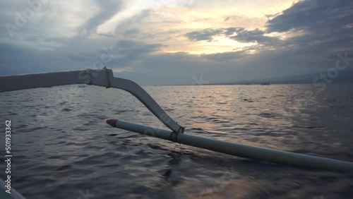 seeing dolphin atractions on the lovina beach, Bali photo