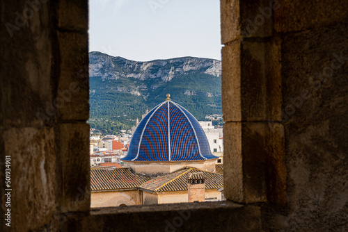 Dome in mediterranean style, with blue roof tliles.