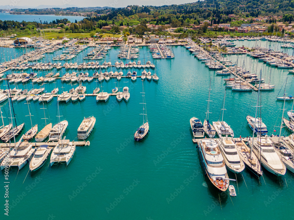 Aerial drone photo of famous Gouvia Marina with luxury yachts and sail boats docked, Corfu island , Greece