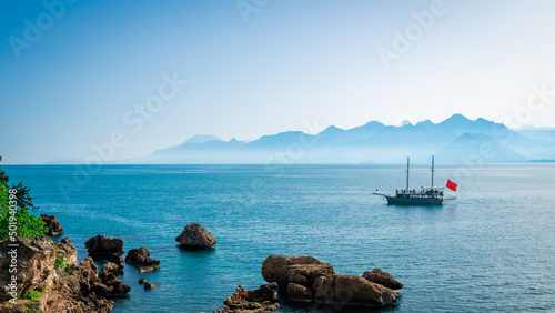 Fototapeta Naklejka Na Ścianę i Meble -  Antalya, Turkey. Sailing Ship For Sea Tours. Mediterranean landscape