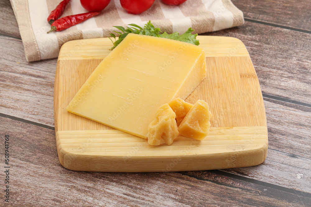 Parmesan hard cheese with small pieces Parmesan hard cheese with small pieces