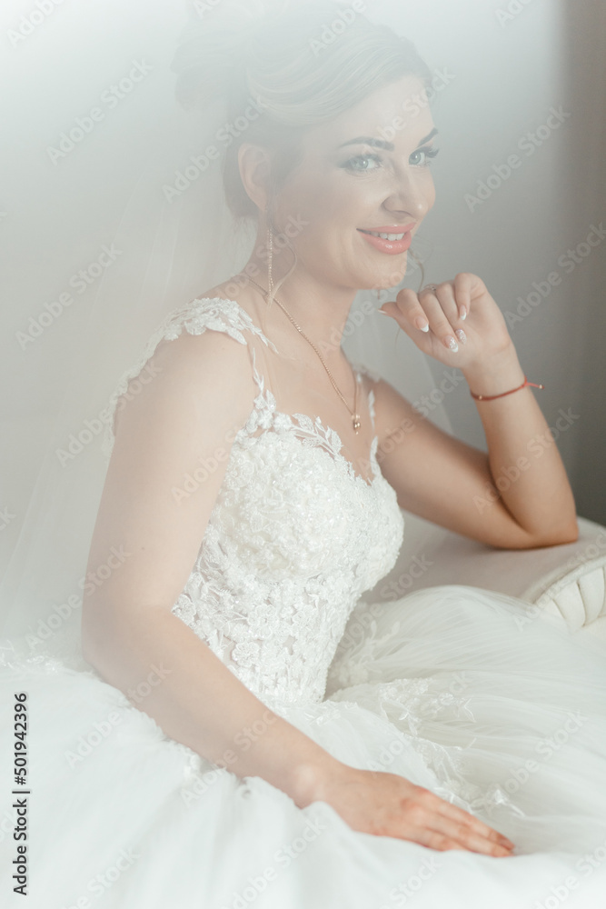 Portrait of a smiling bride on the sofa Portrait of a smiling bride on the sofa