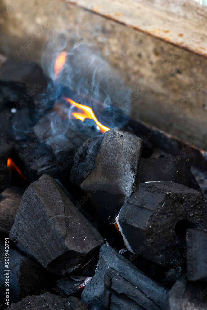 Close up shot of burning wood and charcoal used for barbeque Close up shot of burning wood and charcoal used for barbeque
