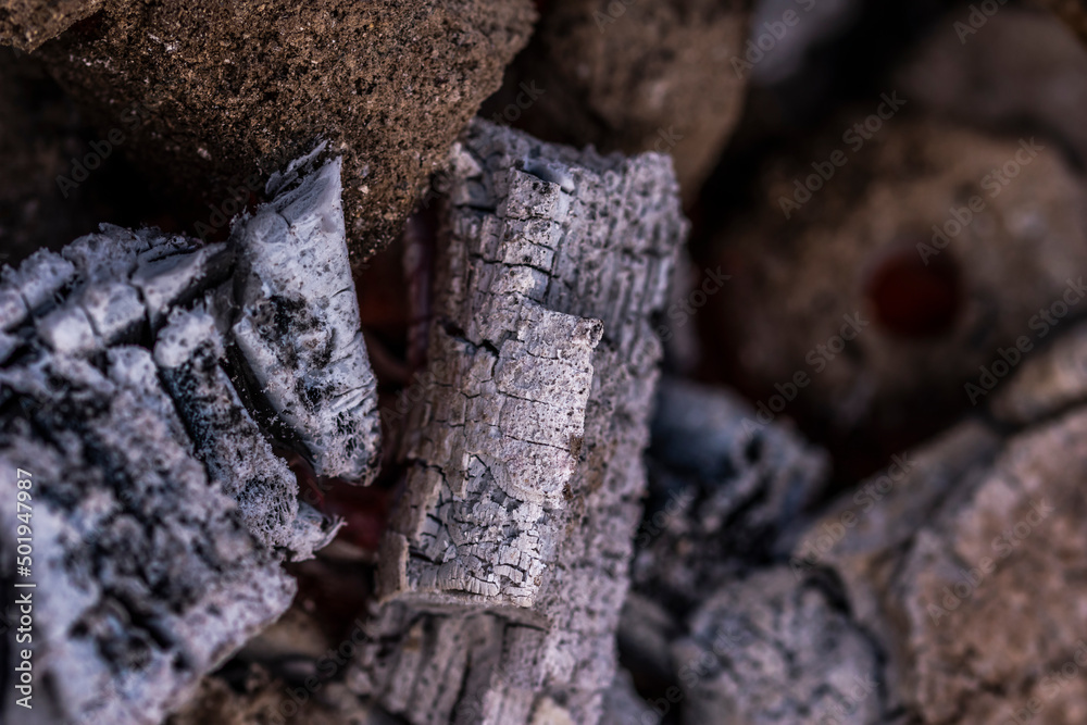 Close up shot of burning wood and charcoal used for barbeque