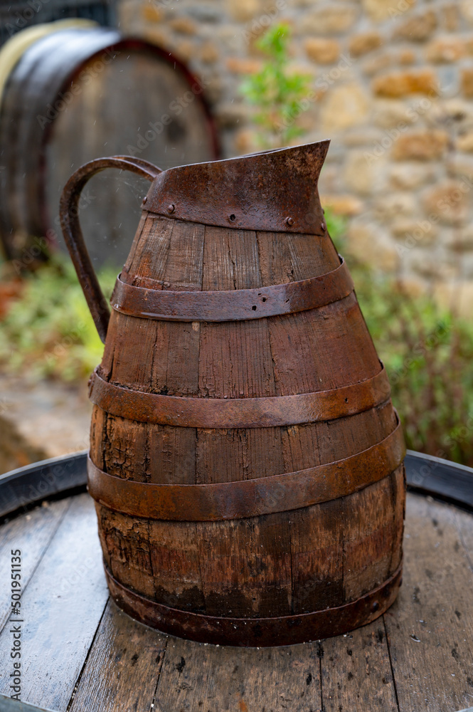Equipment for producing of red, rose and white wine on South of France in Provence. Wooden grape juice jug.