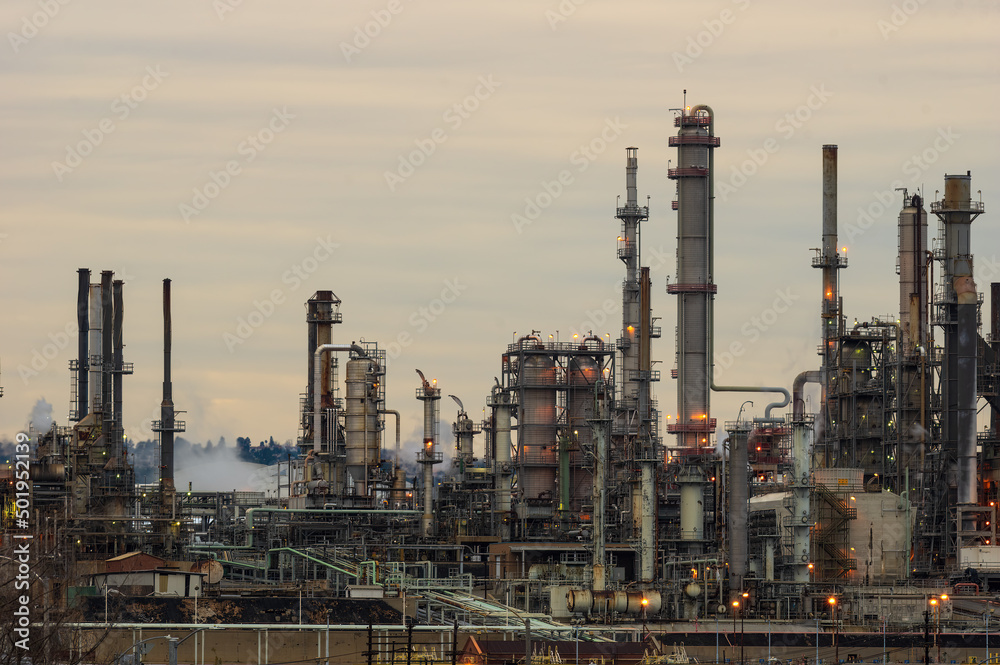 San Pedro - Los Angeles, California, USA - February 1, 2021: image of oli refineries taken at dusk shown in north San Pedro. San Pedro - Los Angeles, California, USA - February 1, 2021: image of oli refineries taken at dusk shown in north San Pedro.
