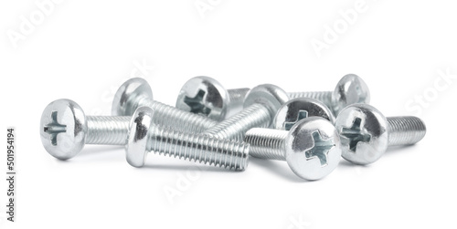 Many metal machine screw bolts on white background photo