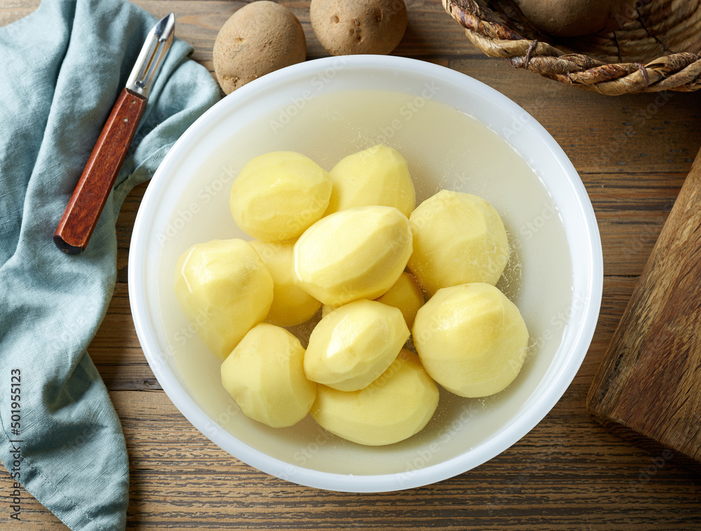 fresh raw peeled potatoes fresh raw peeled potatoes