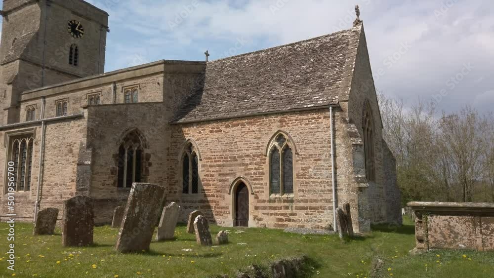 A rural church in Oxfordshire, Lower Heyford, Pan left along building A rural church in Oxfordshire, Lower Heyford, Pan left along building