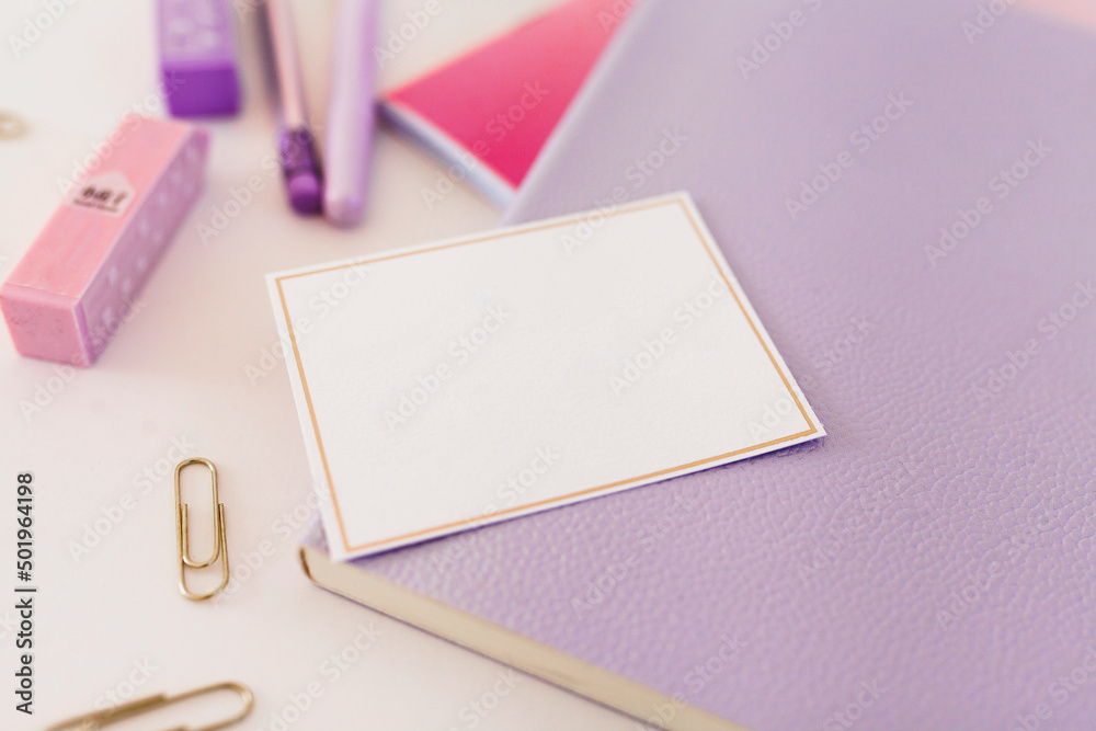 Layout with office. Notepads, greeting card, paper clips, eraser, pen with space for text Layout with office. Notepads, greeting card, paper clips, eraser, pen with space for text
